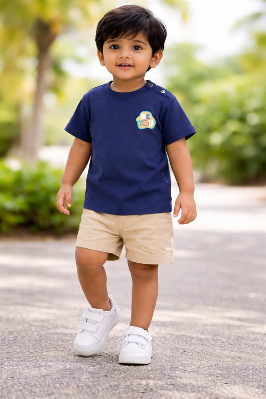 Cute Toddler Boy in Casual Summer Outfit Walking Outdoors