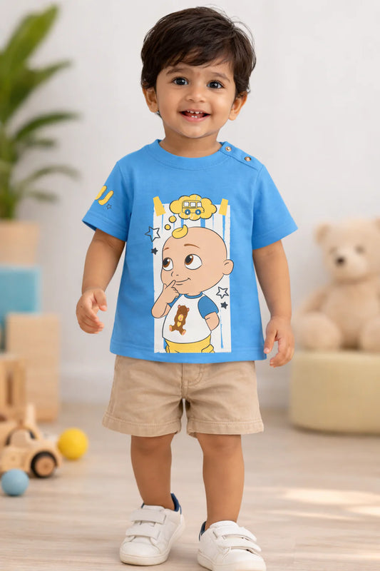 Adorable Toddler Boy in Cartoon Print T-Shirt Indoors